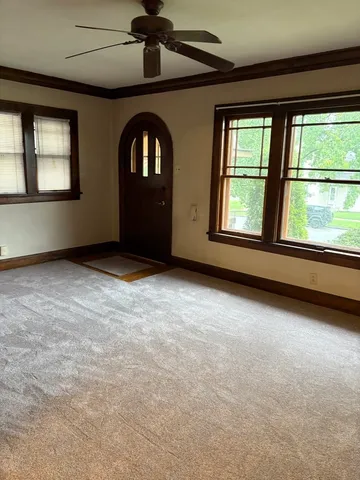 an empty room with windows