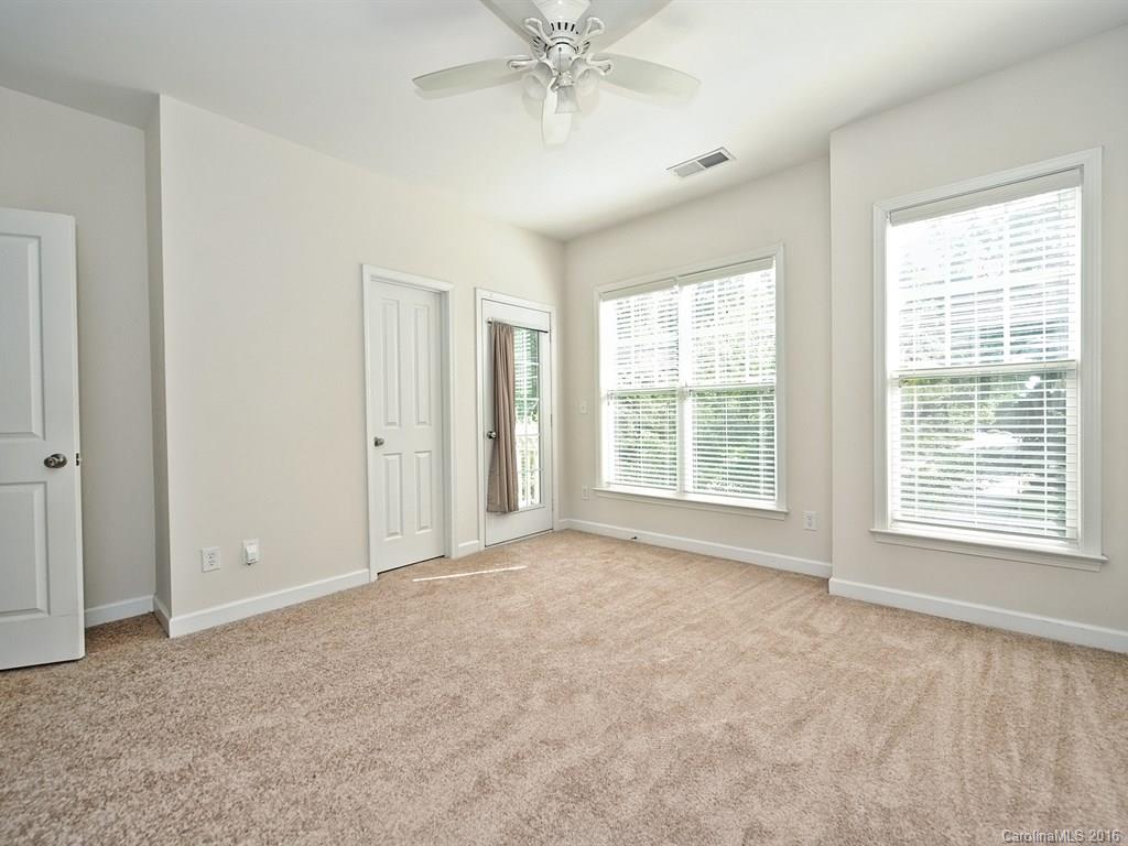 4142 Walker Road, Unit 4142 Charlotte, NC 28211 - Photo 14 of 22 a view of an empty room with a window