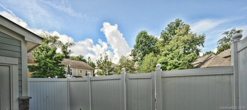 4142 Walker Road, Unit 4142 Charlotte, NC 28211 - Photo 20 of 22 a view of a wooden fence