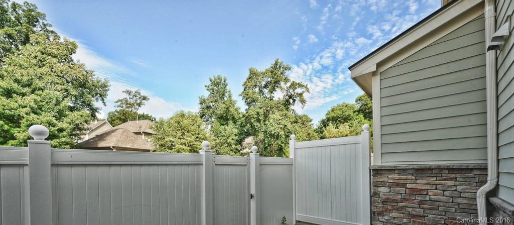 4142 Walker Road, Unit 4142 Charlotte, NC 28211 - Photo 21 of 22 a view of a house with a tree