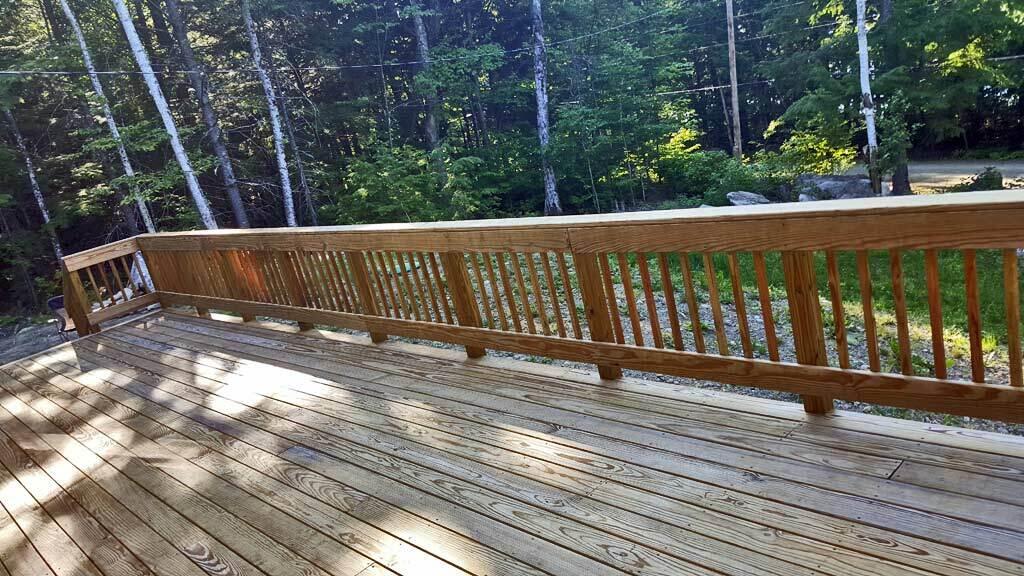 91 Sandy Beach Road Danforth, ME 04424 - Photo 14 of 56 big-wrap-around-lake-deck