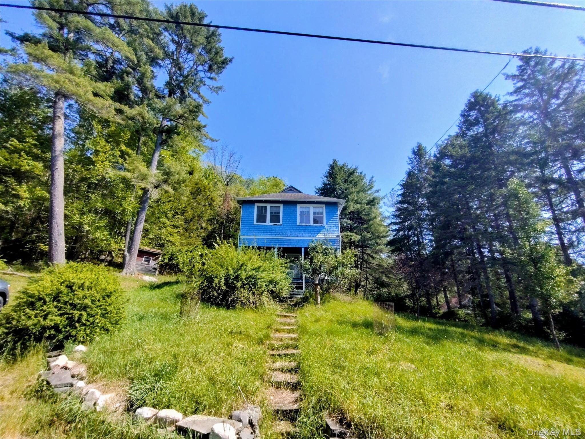 174 Forestburgh Road Forestburgh, NY 12777 - Photo 14 of 28 a view of a back yard of the house