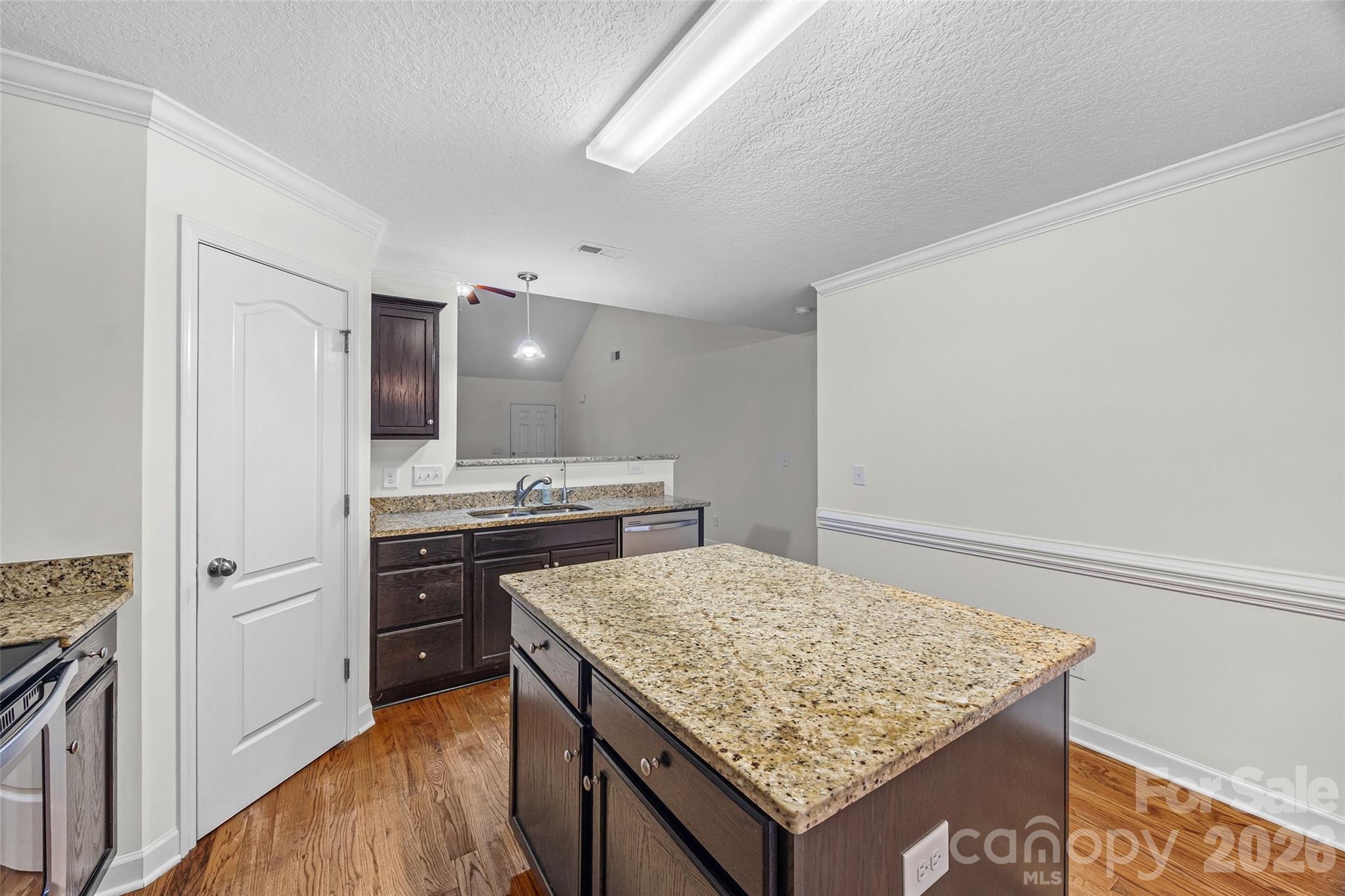 6115 Chandler Road Clover, SC 29710 - Photo 11 of 36 a kitchen with a stove and a refrigerator