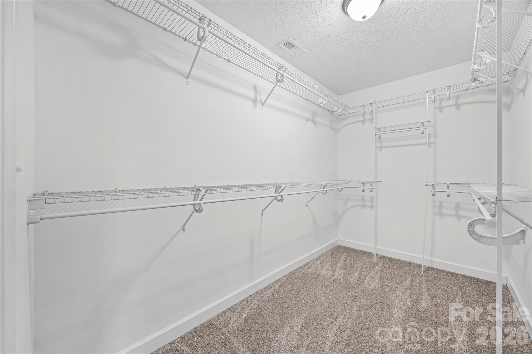 6115 Chandler Road Clover, SC 29710 - Photo 21 of 36 a view of a room with racks on the wall