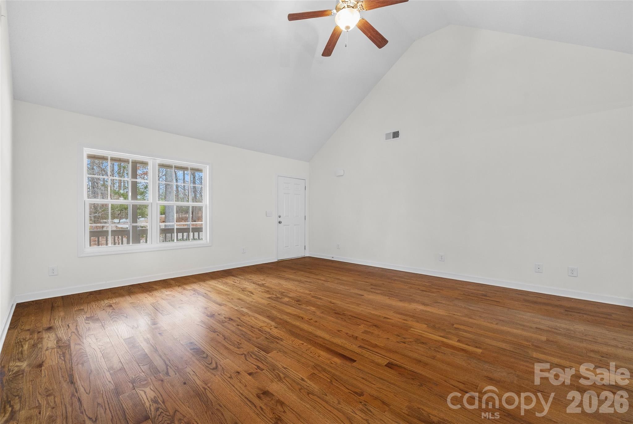 6115 Chandler Road Clover, SC 29710 - Photo 7 of 36 wooden floor in an empty room with a window