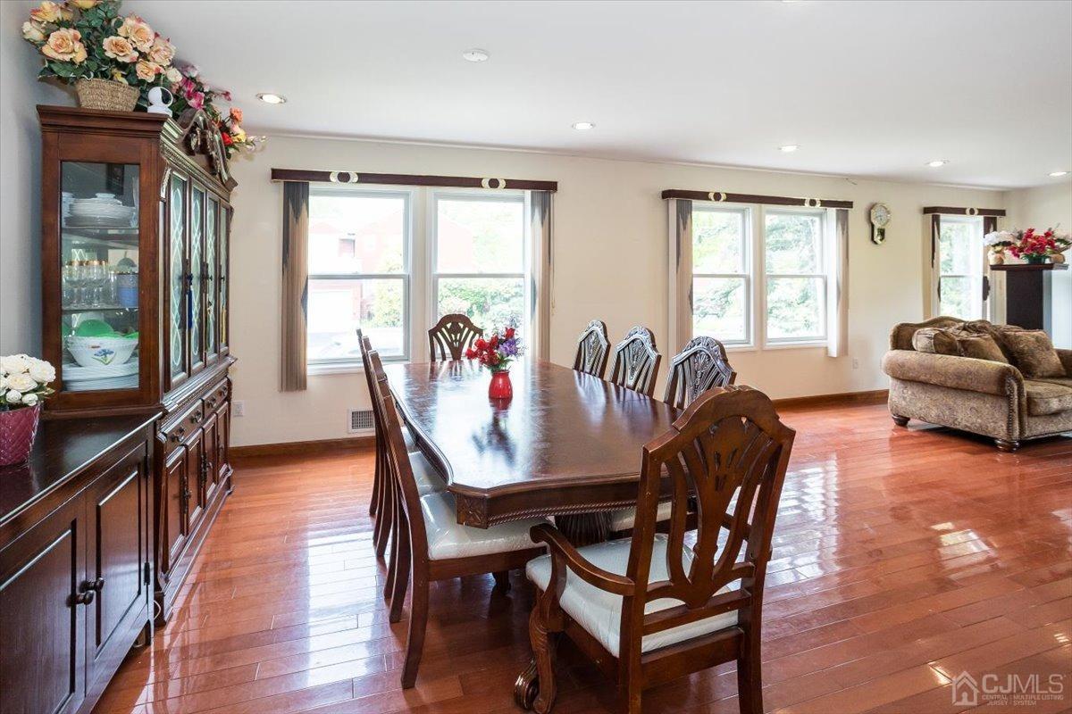 19 Elizabeth Avenue Edison, NJ 08820 - Photo 12 of 48 a view of a a dining room with furniture window and wooden floor