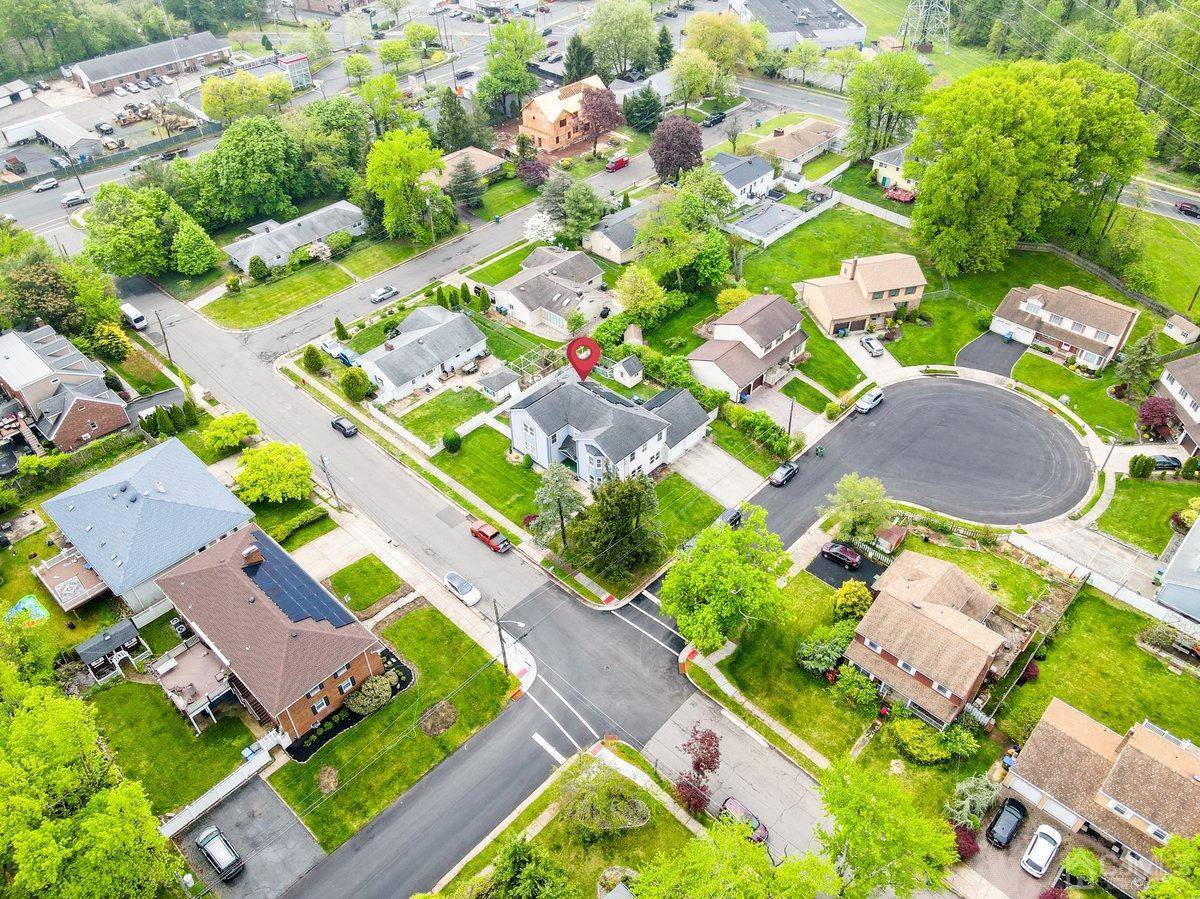 19 Elizabeth Avenue Edison, NJ 08820 - Photo 41 of 48 an aerial view of residential houses with outdoor space