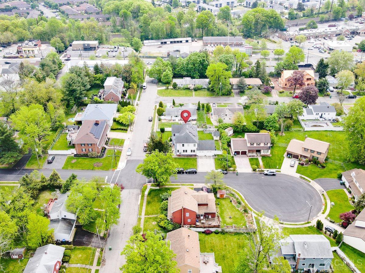 19 Elizabeth Avenue Edison, NJ 08820 - Photo 42 of 48 an aerial view of residential houses with outdoor space and swimming pool
