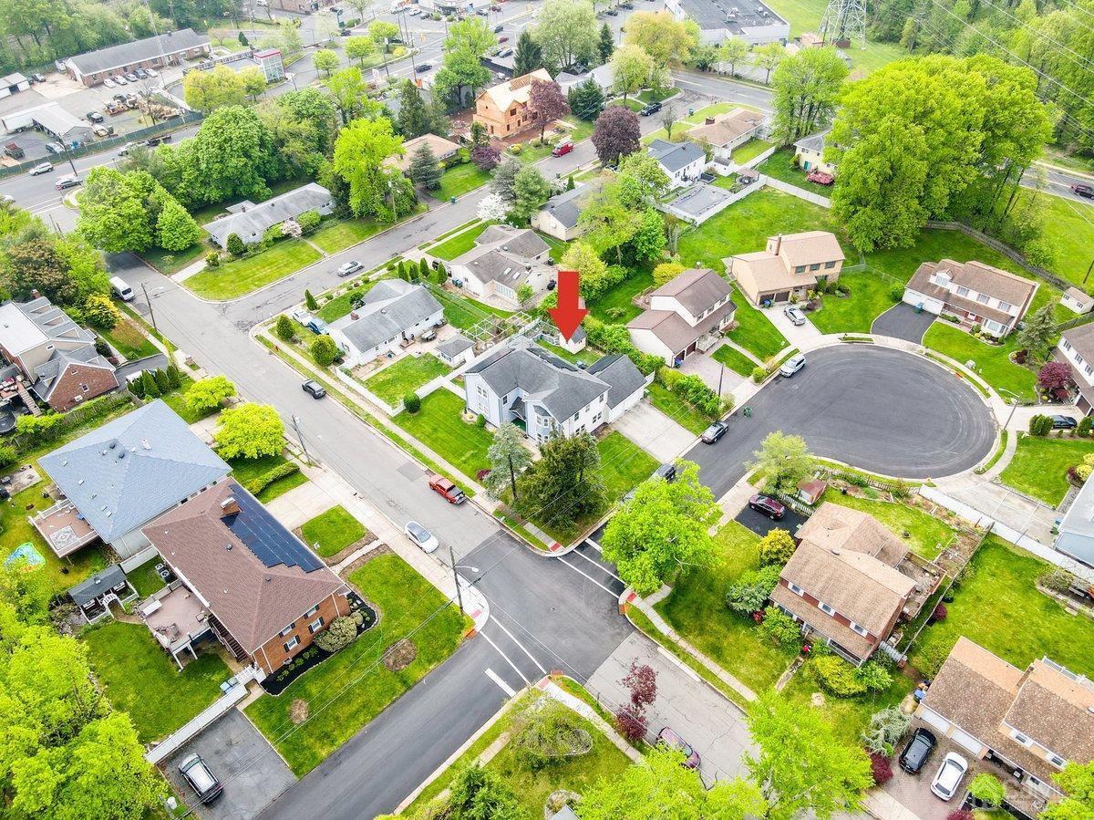 19 Elizabeth Avenue Edison, NJ 08820 - Photo 44 of 48 an aerial view of residential houses with outdoor space