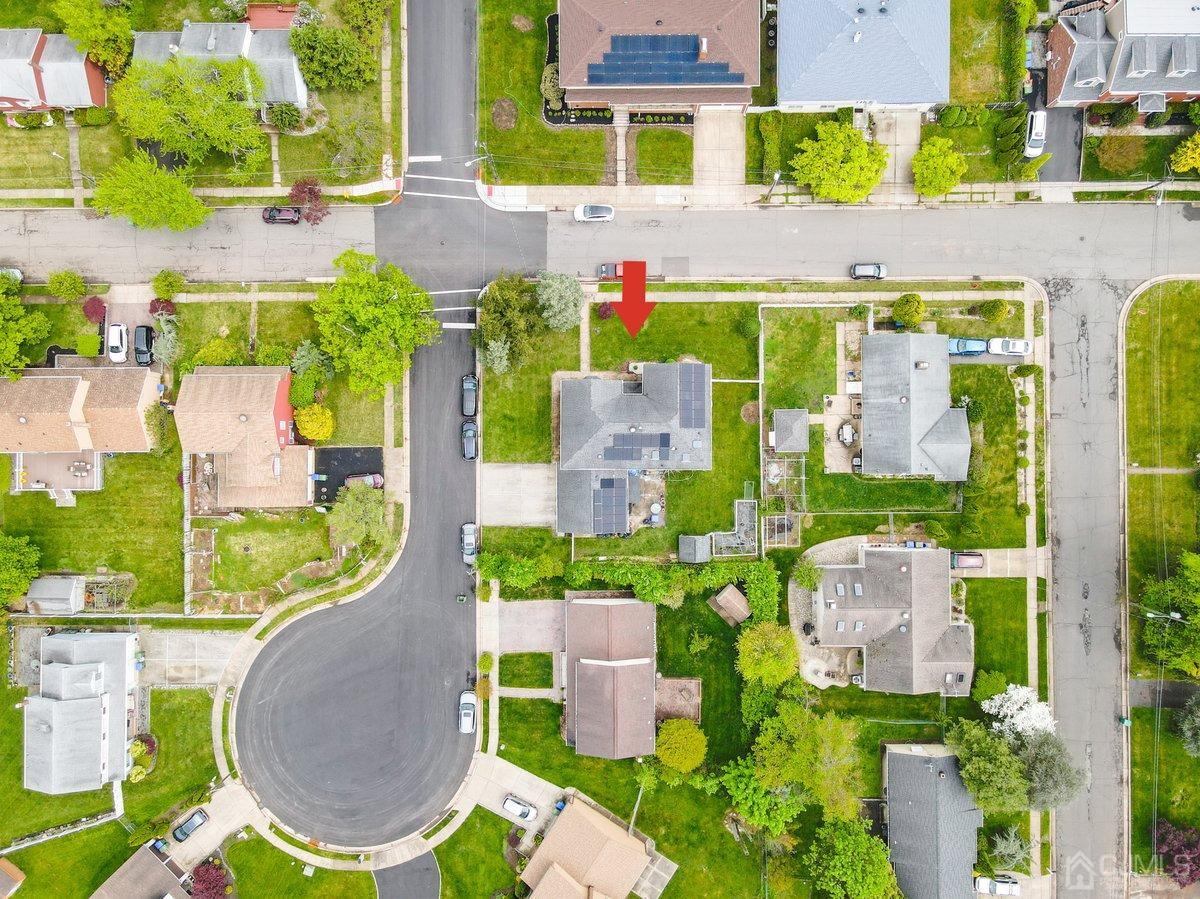 19 Elizabeth Avenue Edison, NJ 08820 - Photo 45 of 48 an aerial view of residential houses with outdoor space and parking
