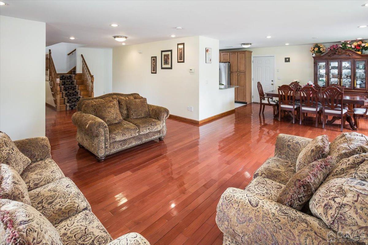 19 Elizabeth Avenue Edison, NJ 08820 - Photo 8 of 48 a living room with furniture and wooden floor