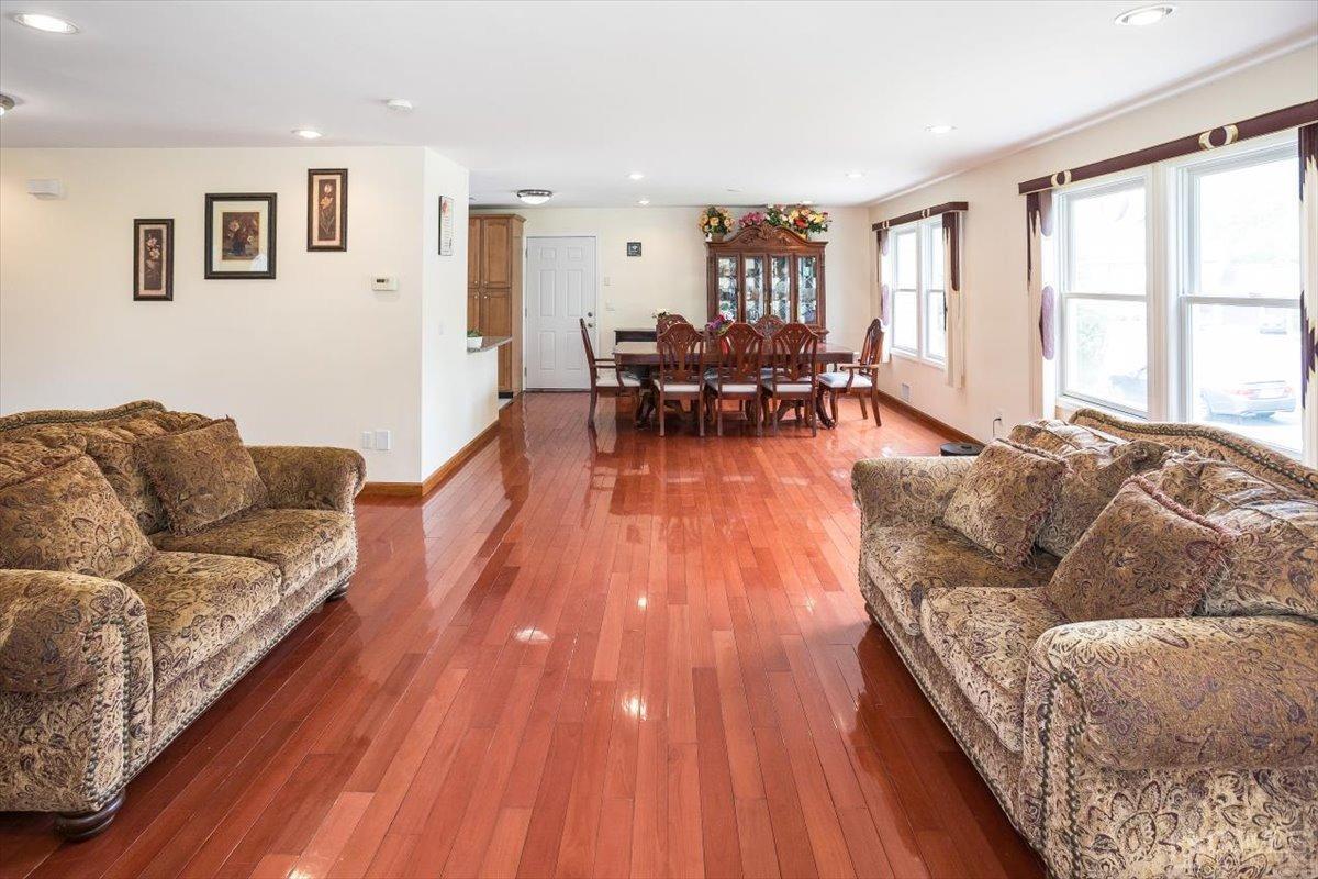 19 Elizabeth Avenue Edison, NJ 08820 - Photo 9 of 48 a living room with furniture and a wooden floor