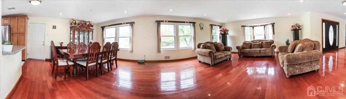 19 Elizabeth Avenue Edison, NJ 08820 - Photo 10 of 48 a living room with furniture and wooden floor