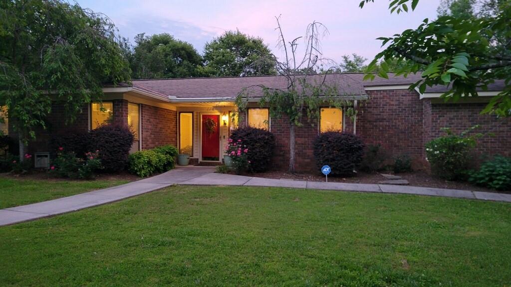 a view of a house with a swimming pool