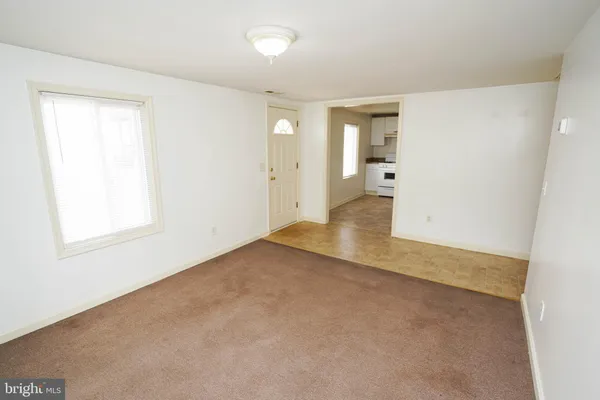 an empty room with a natural light