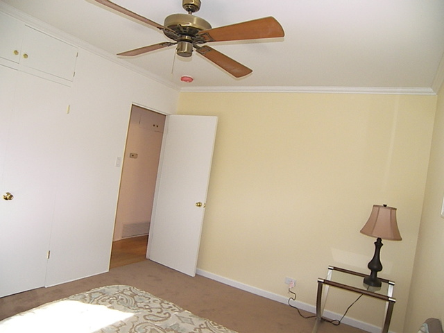1040 Midway Road Northbrook, IL 60062 - Photo 11 of 18 a view of a room with a cabinet and wooden floor