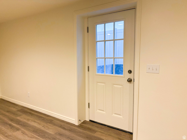 1666 West Foxberry Road Santaquin, UT 84655 - Photo 17 of 23 Doorway with wood finished floors and baseboards