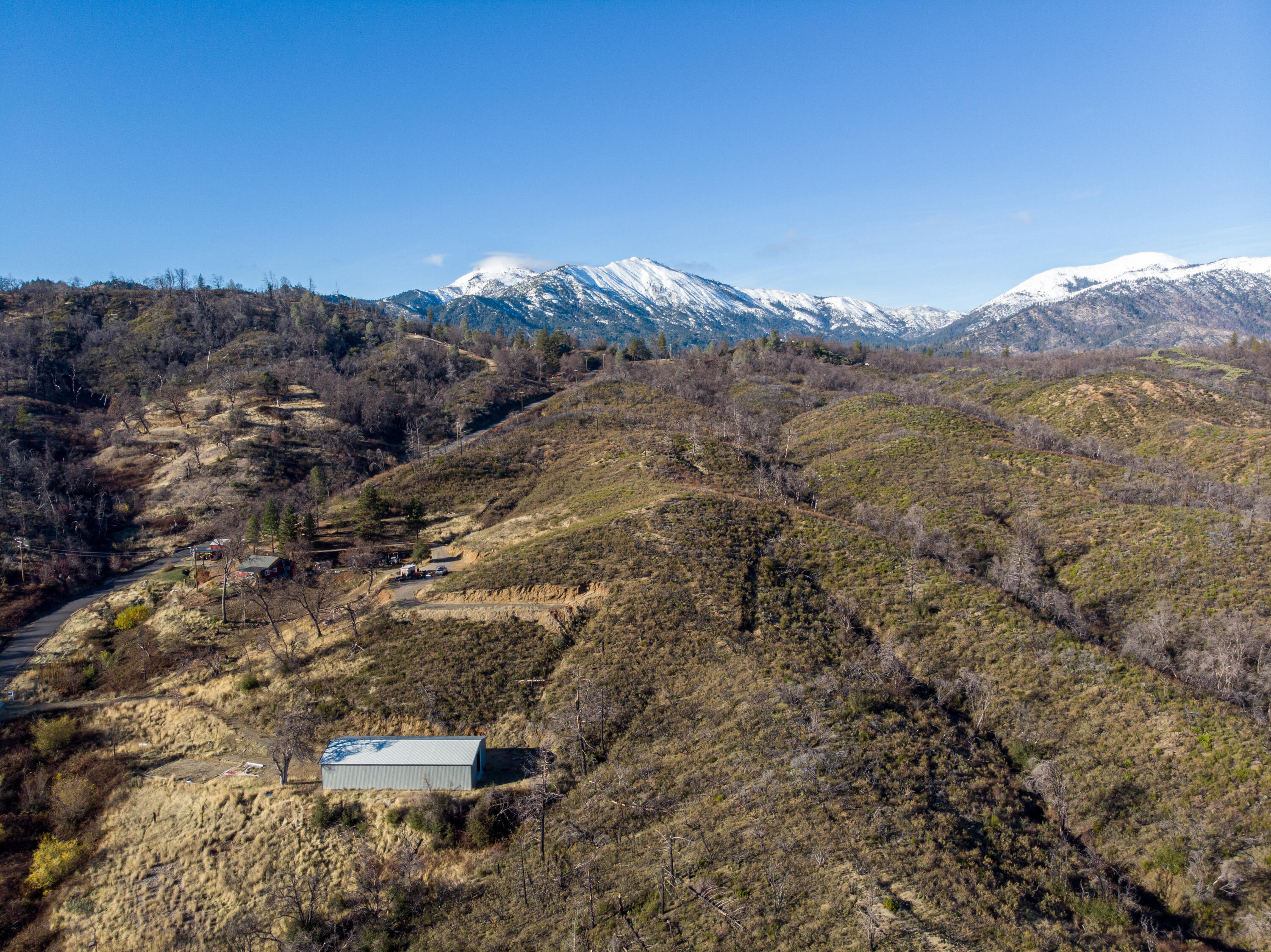 9977 Rainbow Lake Road Igo, CA 96047 - Photo 7 of 16 a view of a city with mountains in the background