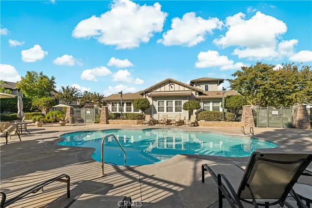 a view of a house with a swimming pool