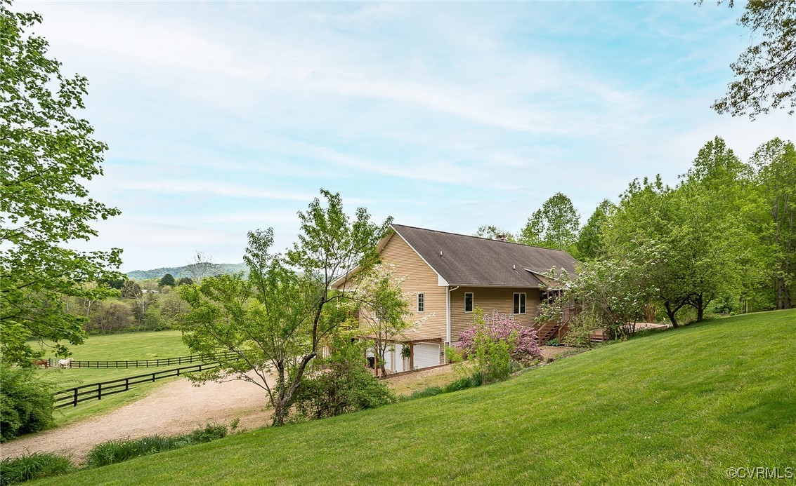 425 Greenfield Road Afton, VA 22920 - Photo 36 of 50 View of side of home featuring a rural view, a yar