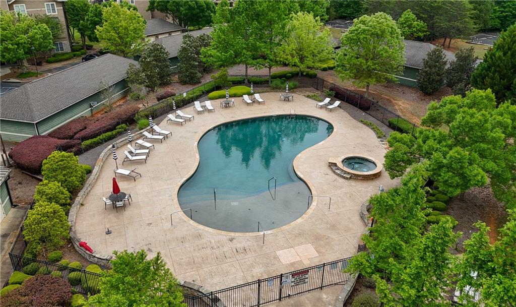117 South Bay Road, Unit 402 Eatonton, GA 31024 - Photo 8 of 48 an aerial view of a house with outdoor space and swimming pool