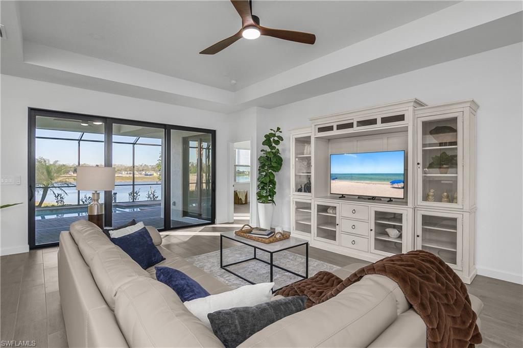 21140 Verawood Loop Estero, FL 33928 - Photo 45 of 50 You'll LOVE the oversized great room and open floor plan, which is perfect for entertaining guests! (photo from nearby staged home)