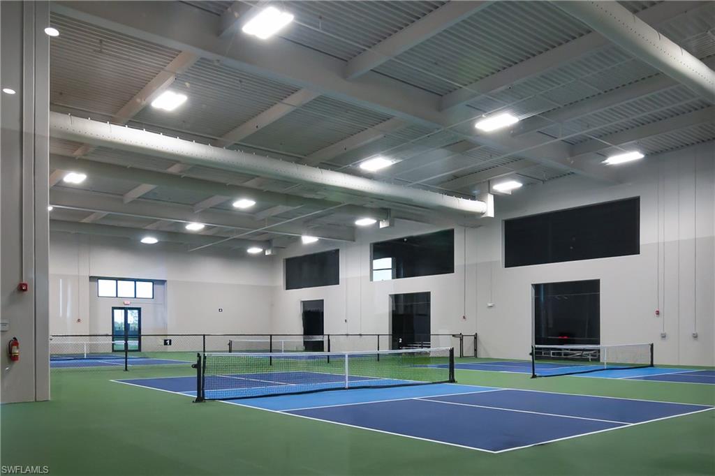 21140 Verawood Loop Estero, FL 33928 - Photo 43 of 50 Indoor pickleball and tennis courts are a huge draw for the Verdana Community.