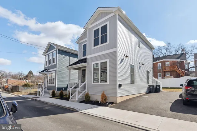 a front view of a house with yard