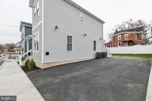 a view of a street with a house