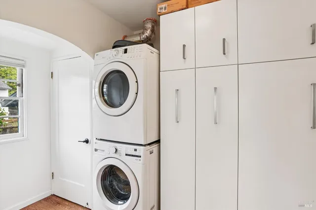 a utility room with dryer and washer