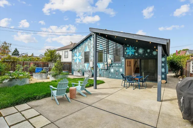 a front view of a house with a fountain