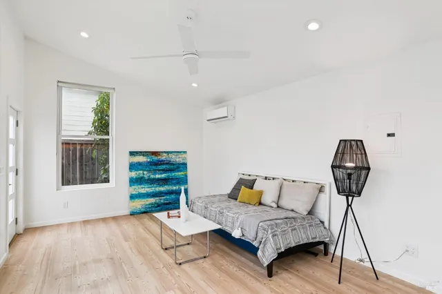 a bathroom with a sink mirror toilet and bathtub