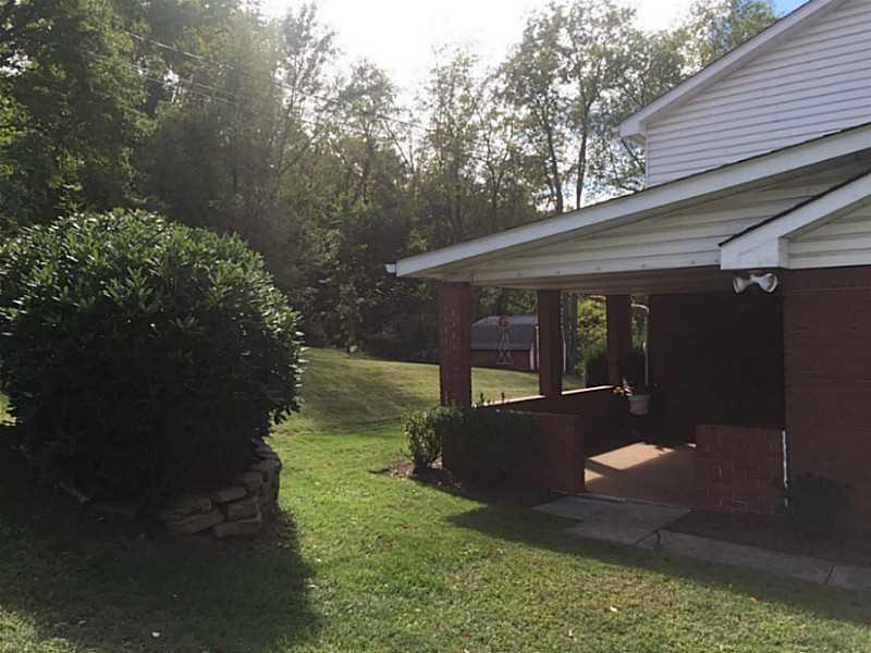 108 Willow Road Rillton, PA 15678 - Photo 23 of 25 Exterior Front. Nice back porch