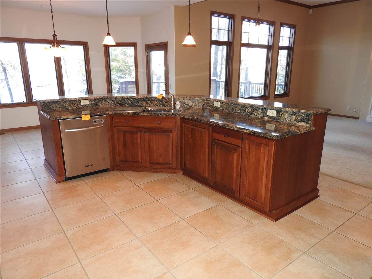 1917 Baintree Road Lake Summerset, IL 61019 - Photo 5 of 25 a kitchen with stainless steel appliances granite countertop a stove a sink and a microwave