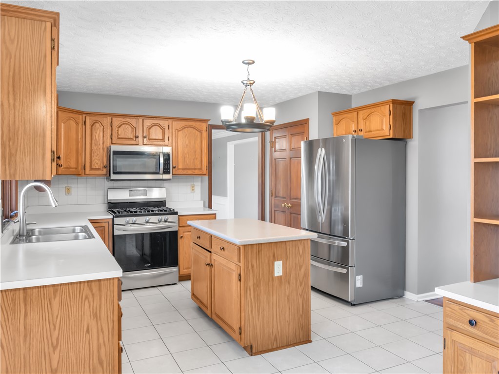 25 Callaway Springboro, OH 45066 - Photo 8 of 51 This spacious kitchen offers a functional layout, perfect for everyday living and entertaining.