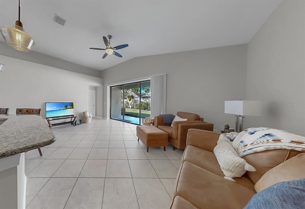 7109 Spindle Tree Lane Riverview, FL 33578 - Photo 27 of 42 a living room with furniture and a window