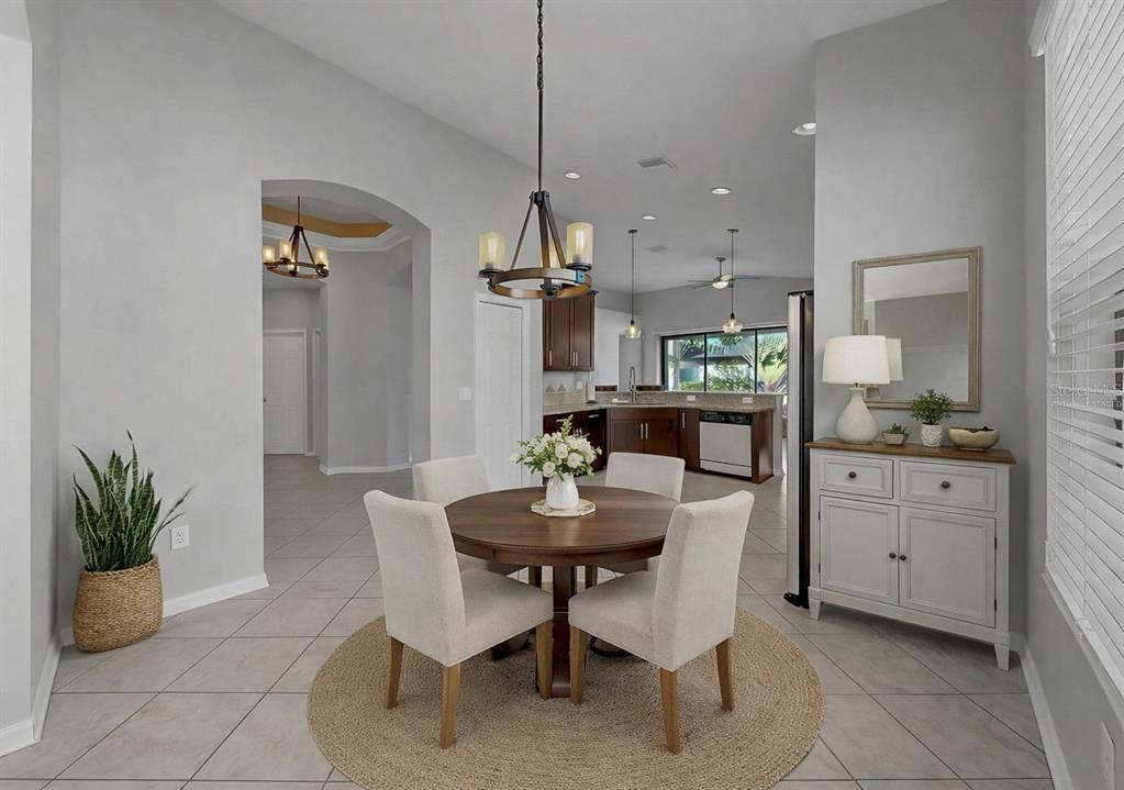 7109 Spindle Tree Lane Riverview, FL 33578 - Photo 39 of 42 a dining room with furniture and window
