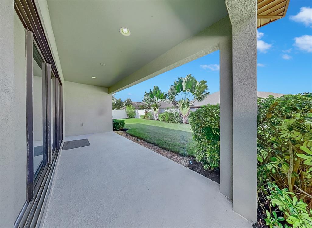 7109 Spindle Tree Lane Riverview, FL 33578 - Photo 10 of 42 a view of a garden from a balcony