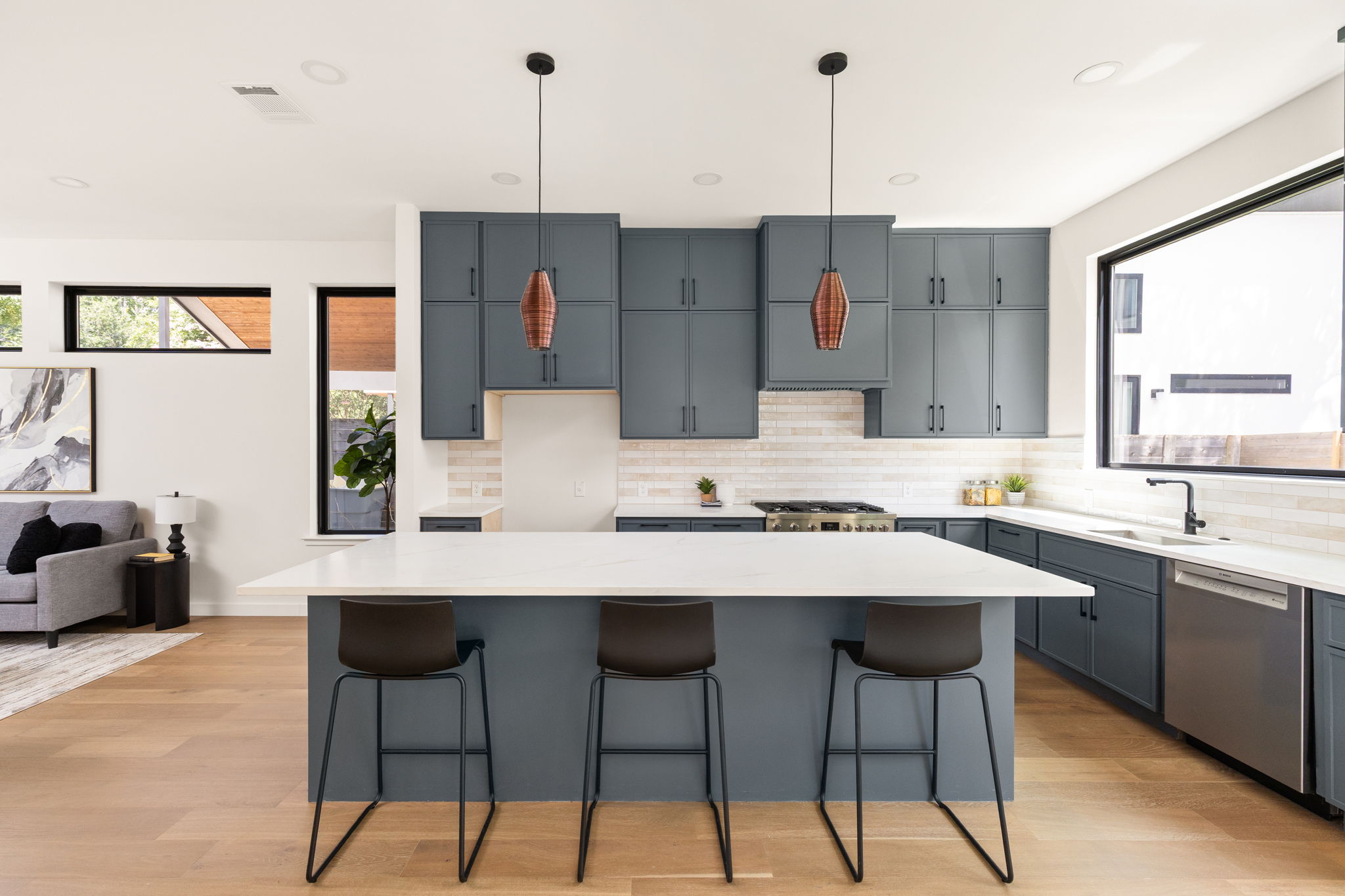 2717 Lyons Road, Unit 1 Austin, TX 78702 - Photo 6 of 40 Culinary dreams come alive in this kitchen with an expansive island and top-tier appliances.