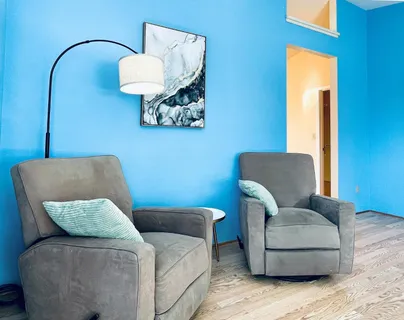 a living room with furniture and a couch