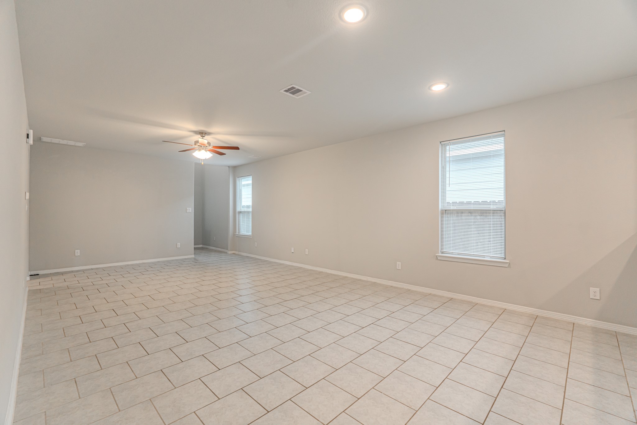 25706 Boxwood Hedge Lane Tomball, TX 77375 - Photo 13 of 44 a view of an empty room with a window