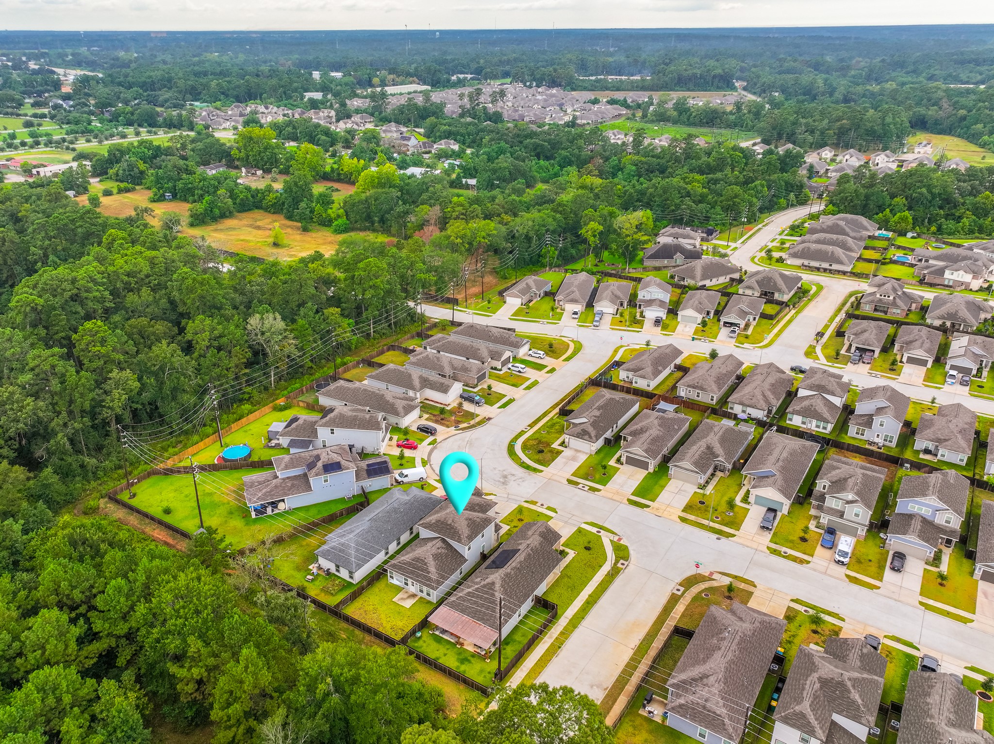 25706 Boxwood Hedge Lane Tomball, TX 77375 - Photo 2 of 44 an aerial view of multiple house