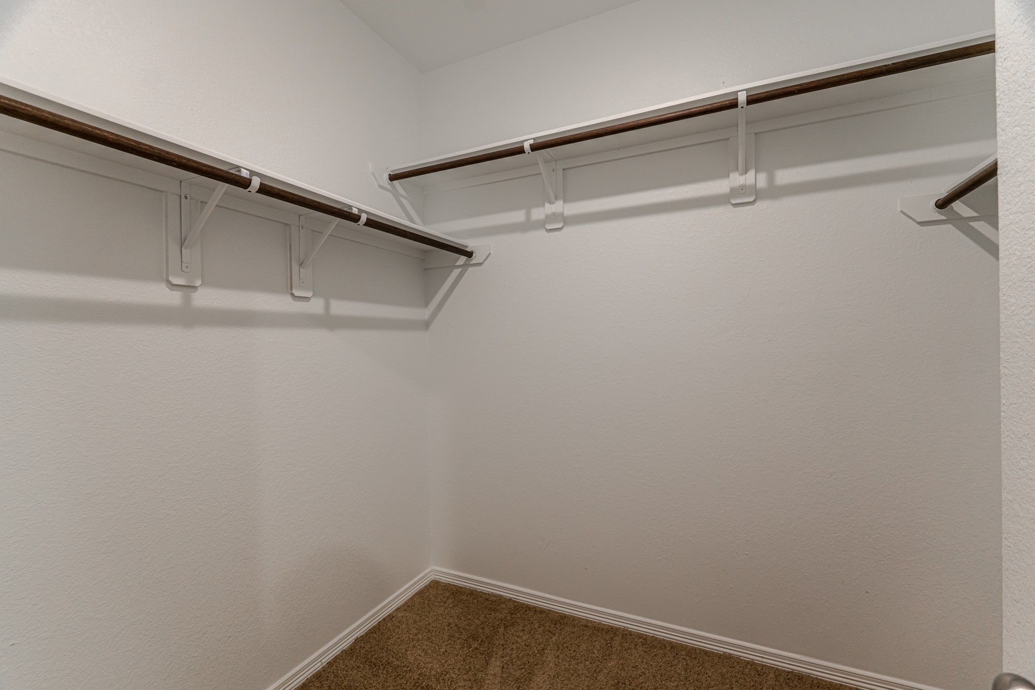 25706 Boxwood Hedge Lane Tomball, TX 77375 - Photo 25 of 44 a view of an empty walk in closet