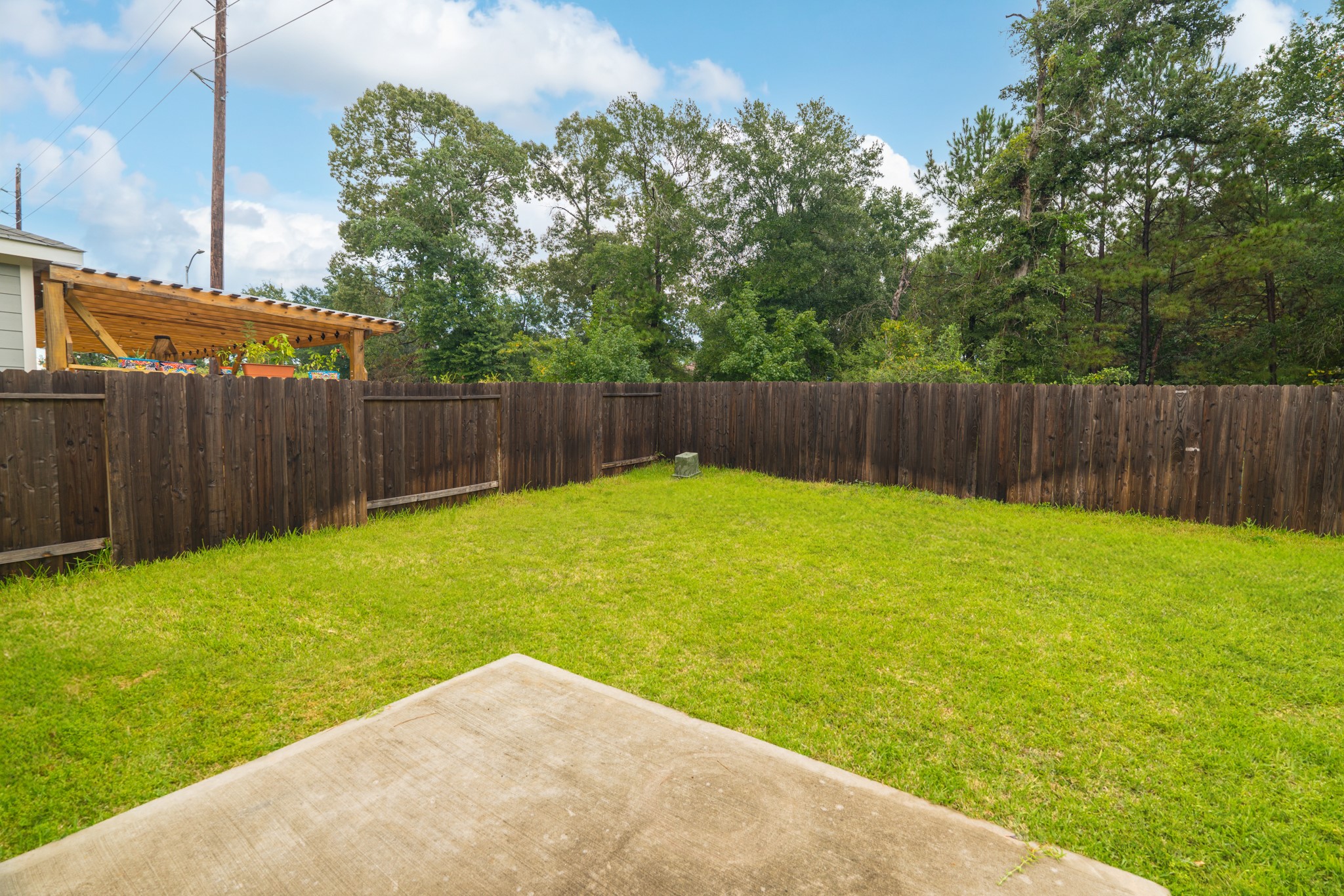 25706 Boxwood Hedge Lane Tomball, TX 77375 - Photo 42 of 44 a view of a backyard