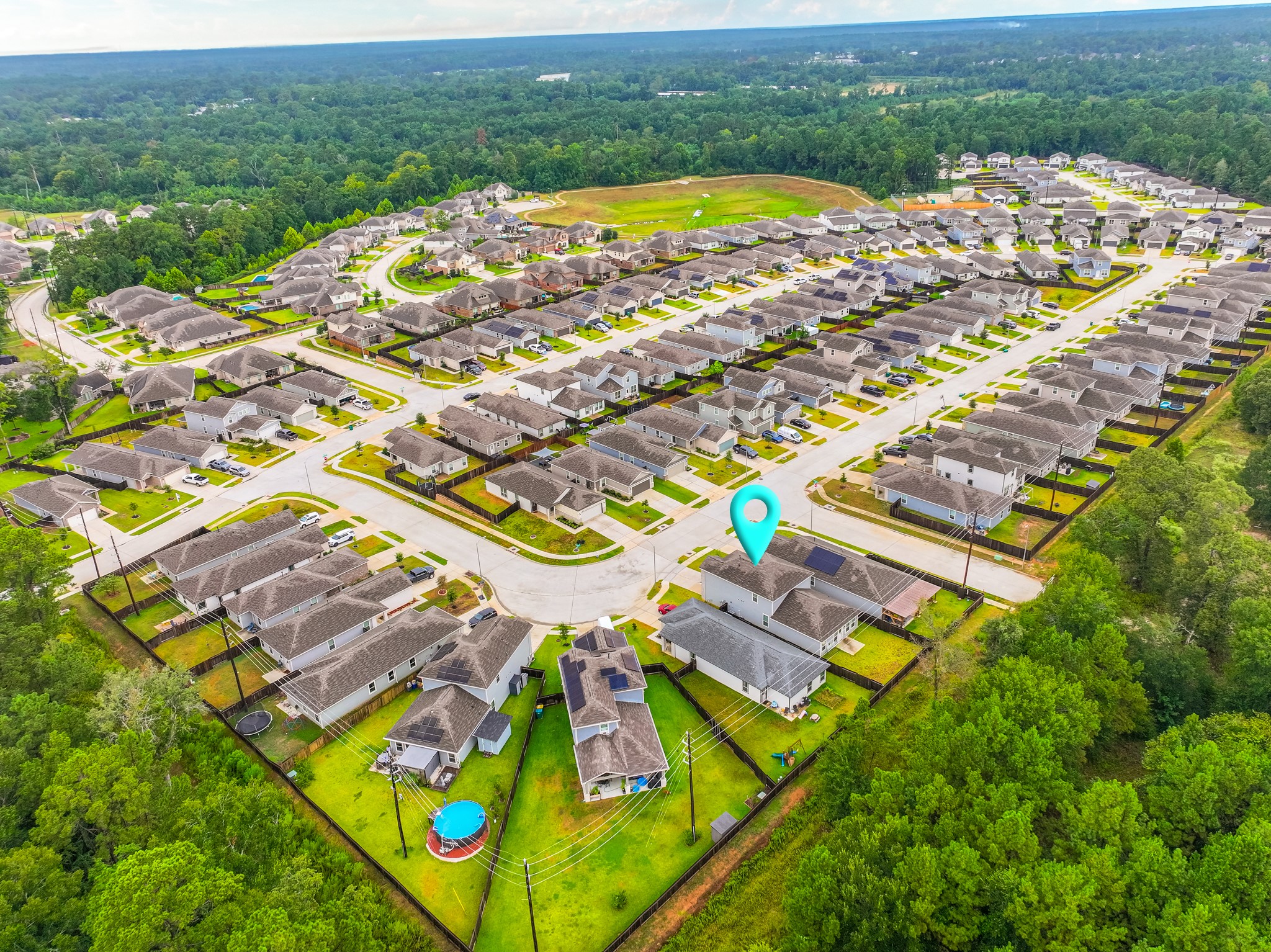 25706 Boxwood Hedge Lane Tomball, TX 77375 - Photo 44 of 44 an aerial view of residential houses with outdoor space