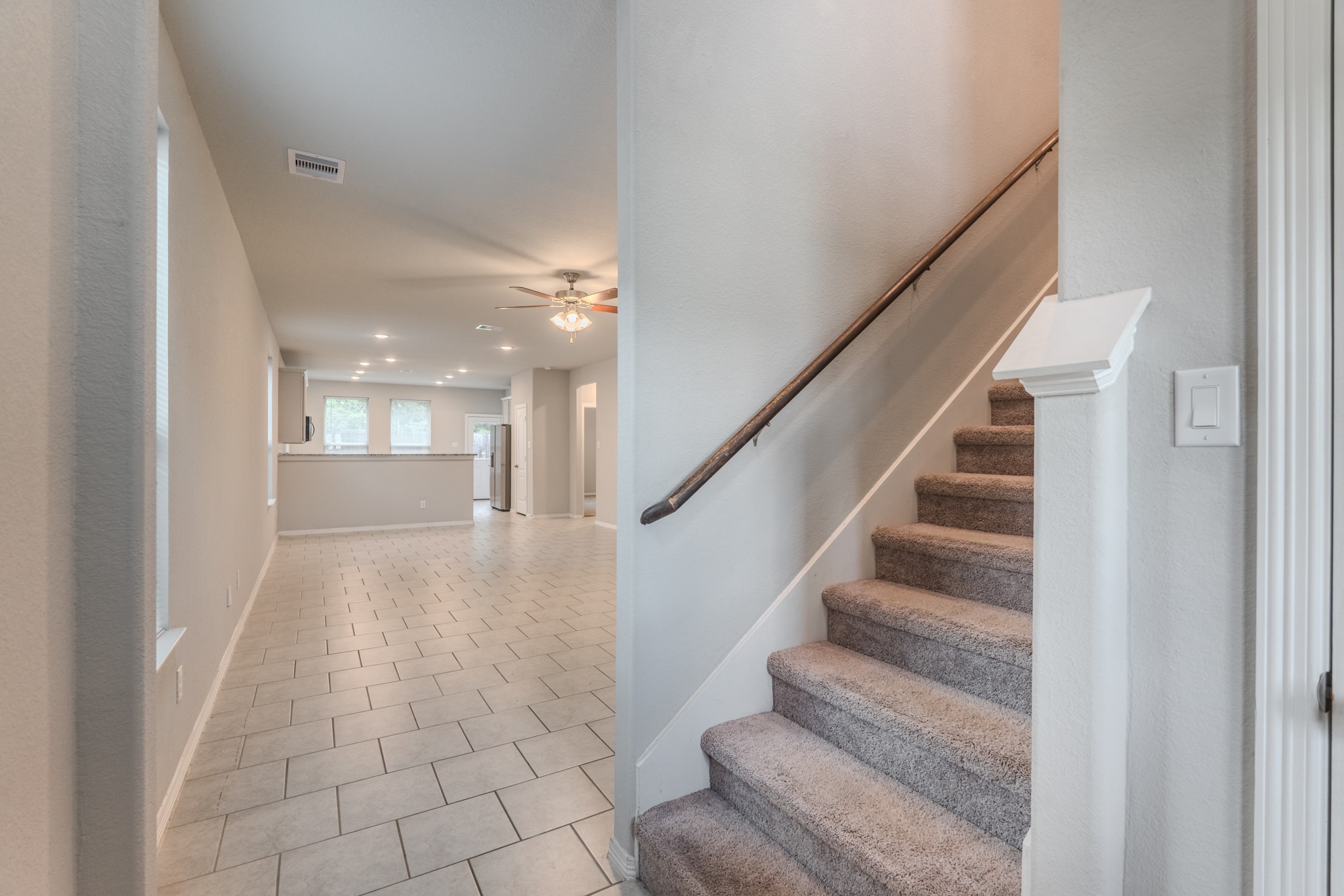 25706 Boxwood Hedge Lane Tomball, TX 77375 - Photo 6 of 44 a view of entryway and hall with wooden floor