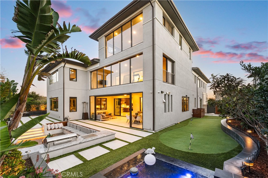 83 Lunar Irvine, CA 92618 - Photo 4 of 75 a front view of a house with garden