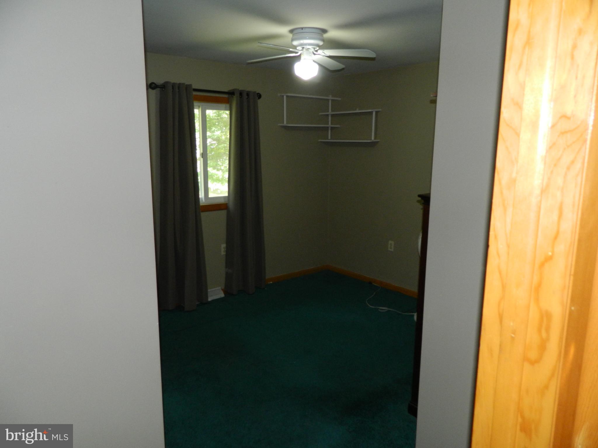 3910 Ady Road Pylesville, MD 21132 - Photo 13 of 24 Cozy room with natural light and green hues.