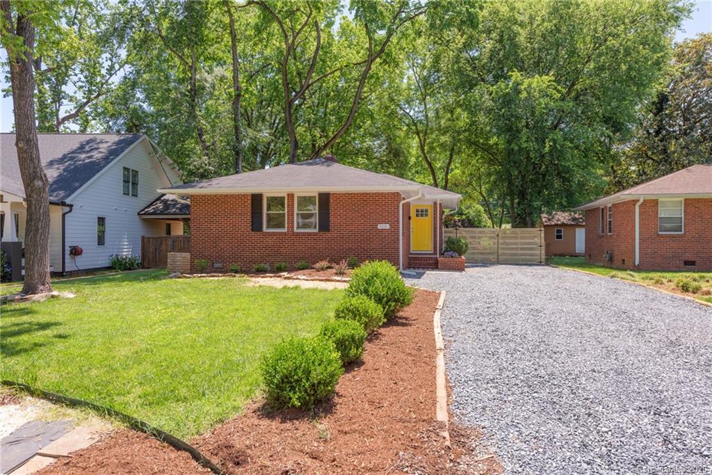 1416 Cortland Road East Charlotte, NC 28209 - Photo 12 of 26 a front view of house with yard and green space