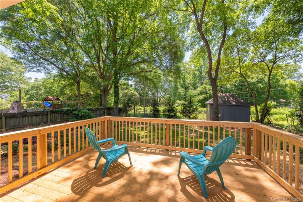 1416 Cortland Road East Charlotte, NC 28209 - Photo 22 of 26 a view of a two chairs in the deck